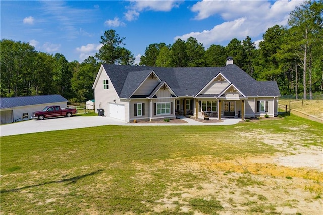 view of front facade featuring a garage and a front yard