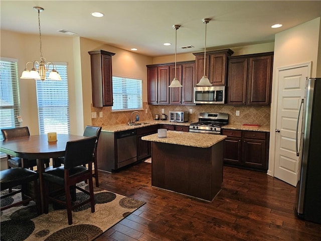 1750 Stone Meadow Rd, Lithonia, GA 30058 - kitchen featuring stainless steel appliances, a chandelier, dark brown cabinetry, dark wood-style flooring, and recessed lighting