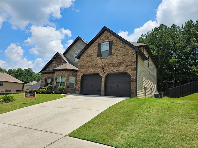 1750 Stone Meadow Rd, Lithonia, GA 30058 - view of front of home featuring a garage, brick siding, and driveway