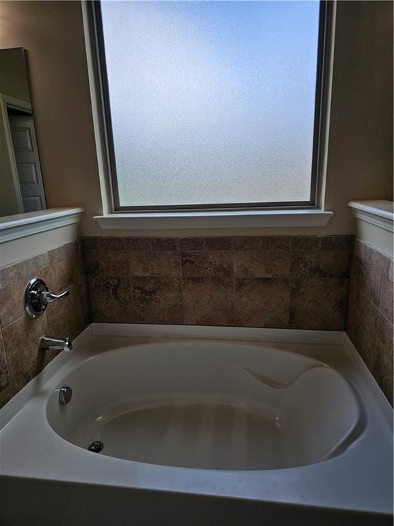 1750 Stone Meadow Rd, Lithonia, GA 30058 - bathroom featuring a bath