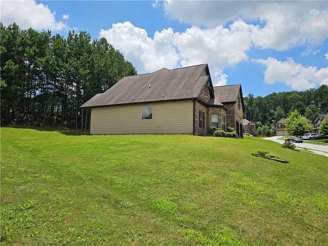 1750 Stone Meadow Rd, Lithonia, GA 30058 - view of property exterior featuring a yard and brick siding