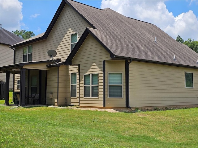 1750 Stone Meadow Rd, Lithonia, GA 30058 - rear view of house featuring a lawn and a shingled roof