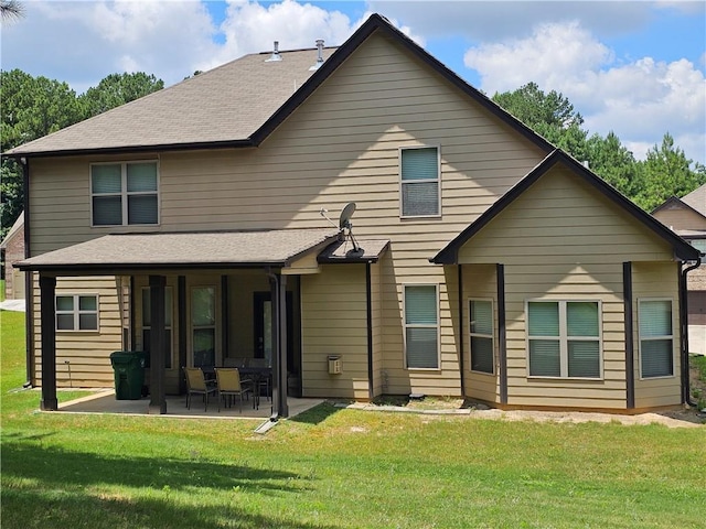 1750 Stone Meadow Rd, Lithonia, GA 30058 - back of property featuring a patio area, a yard, and a shingled roof