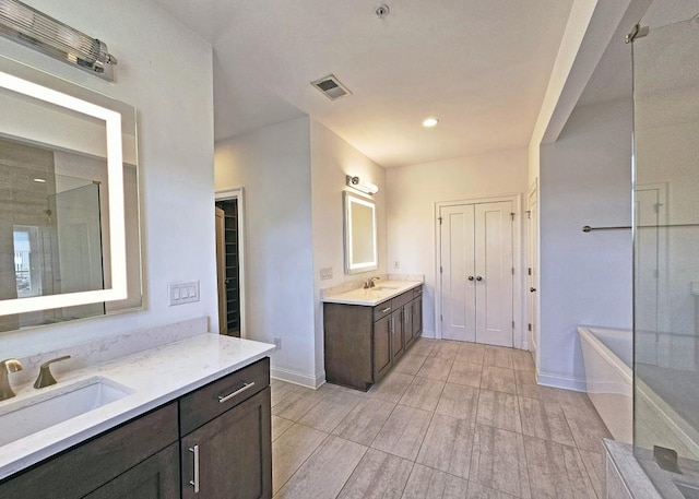 bathroom with separate shower and tub and vanity