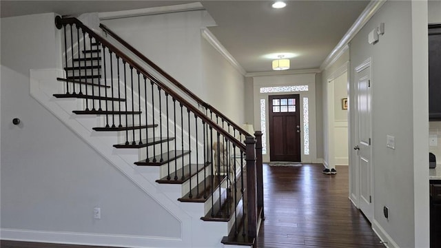 entryway featuring ornamental molding, dark wood finished floors, stairway, baseboards, and recessed lighting