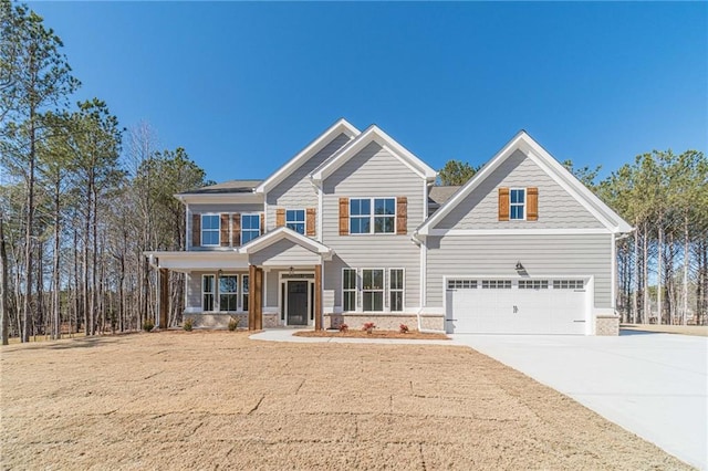 craftsman-style house featuring a garage and covered porch