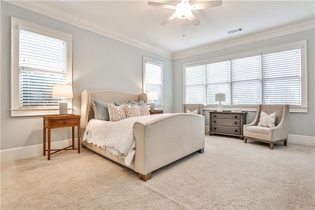 bedroom featuring visible vents, baseboards, ornamental molding, and carpet flooring