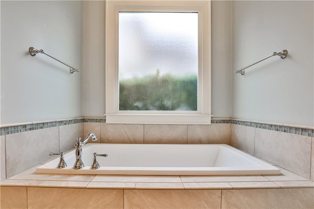 bathroom featuring a garden tub