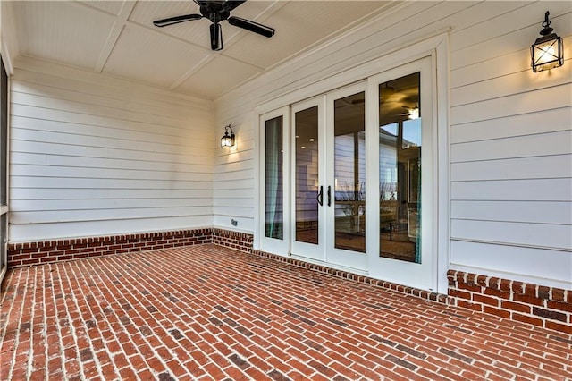 view of patio / terrace with a ceiling fan and french doors
