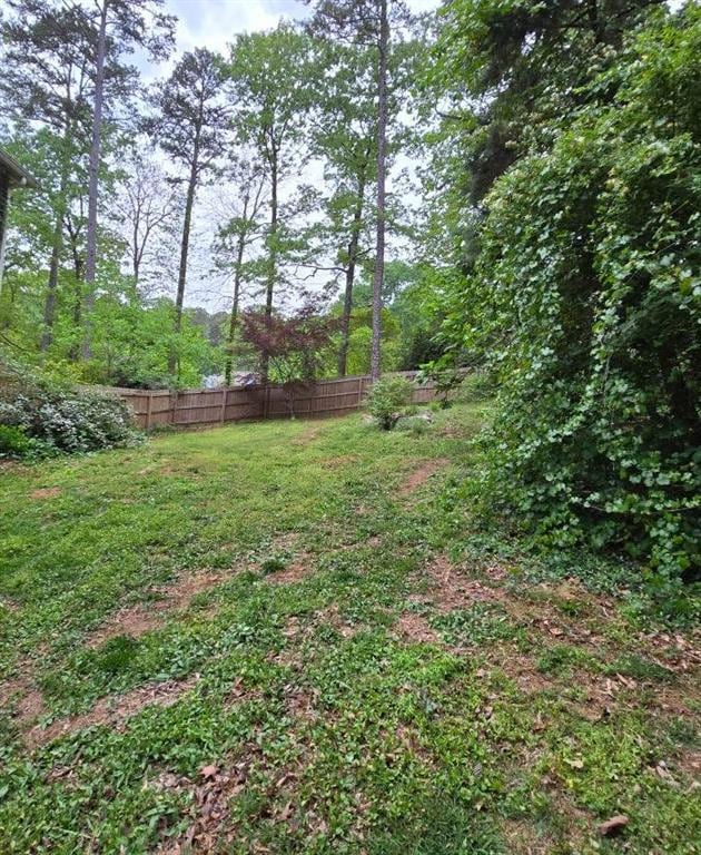 view of yard with fence