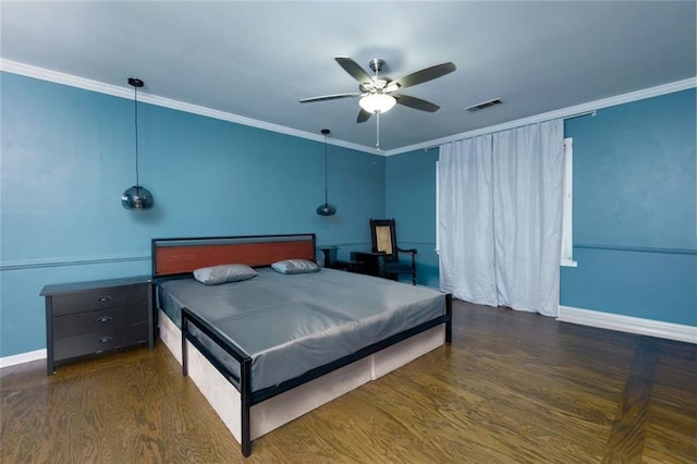 bedroom with visible vents, crown molding, and baseboards