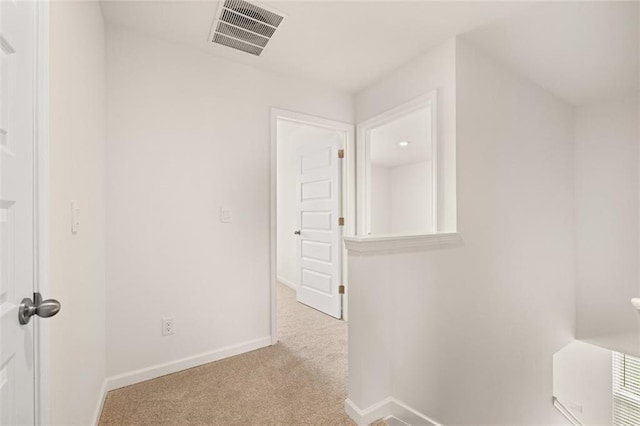 215 Amberjack Trl, Covington, GA 30016 - hallway with carpet floors and baseboards