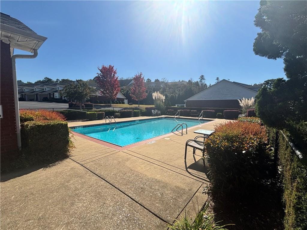 view of pool with a patio