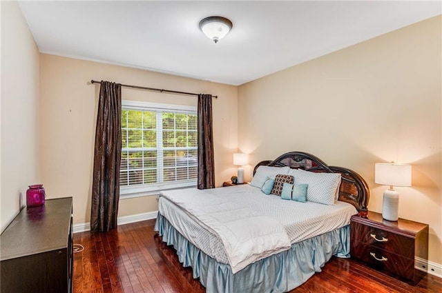 bedroom featuring dark hardwood / wood-style floors