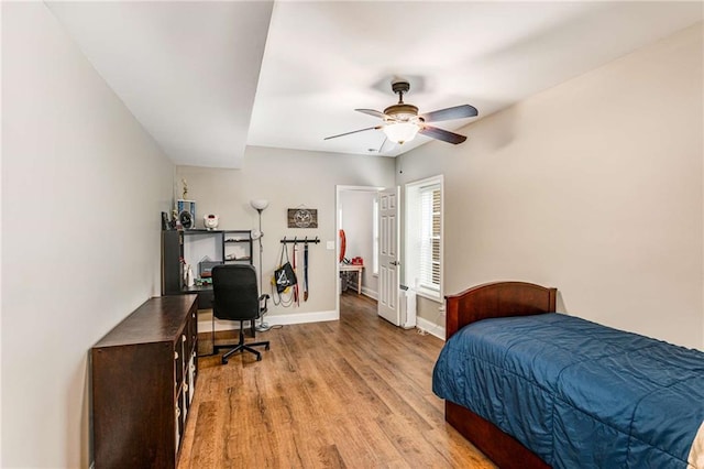 bedroom featuring ceiling fan and light hardwood / wood-style floors