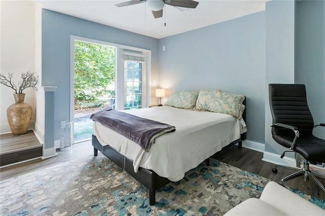 bedroom featuring wood finished floors and ceiling fan