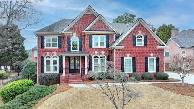 view of front facade featuring brick siding