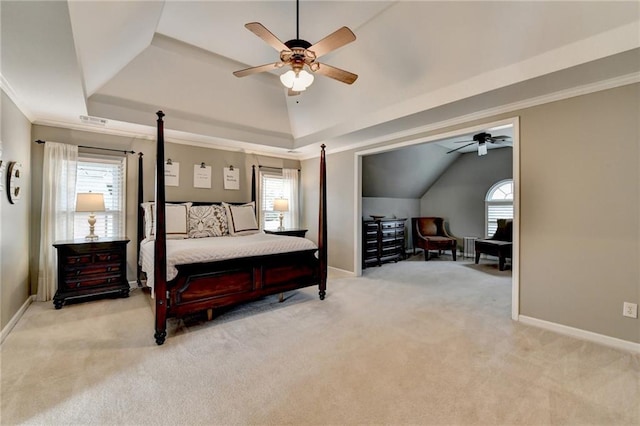 bedroom featuring light colored carpet, crown molding, baseboards, and multiple windows