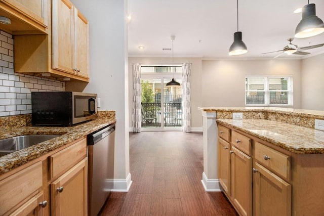 2230 Cheshire Bridge Rd NE Unit 401, Atlanta, GA 30324 - kitchen featuring stainless steel appliances, decorative backsplash, crown molding, healthy amount of natural light, and dark wood-style floors