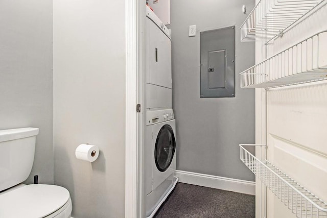 2230 Cheshire Bridge Rd NE Unit 401, Atlanta, GA 30324 - bathroom featuring electric panel and stacked washer / dryer