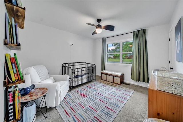 bedroom featuring carpet floors and a ceiling fan