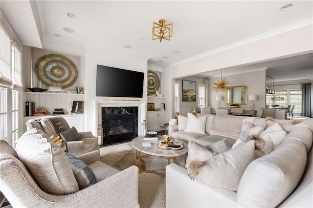 2110 Timball Rd NW, Atlanta, GA 30318 - living room featuring crown molding, a premium fireplace, and built in shelves