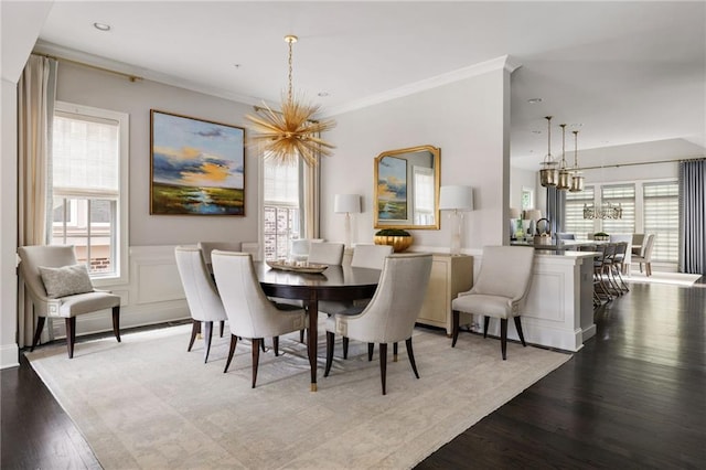 2110 Timball Rd NW, Atlanta, GA 30318 - dining room featuring a chandelier, plenty of natural light, wood finished floors, and ornamental molding