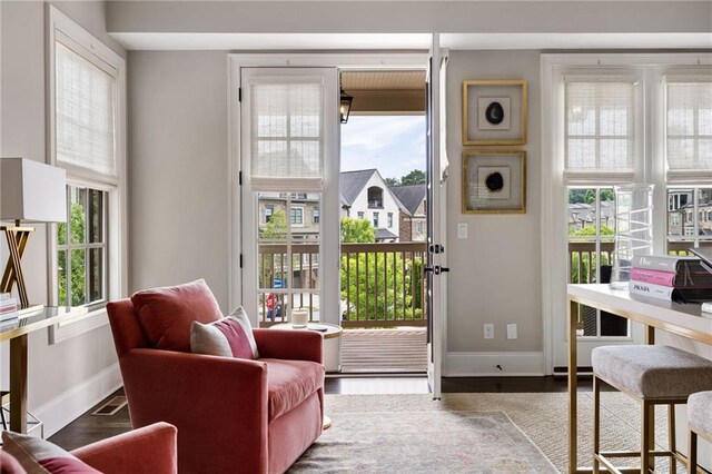 2110 Timball Rd NW, Atlanta, GA 30318 - doorway featuring baseboards and wood finished floors