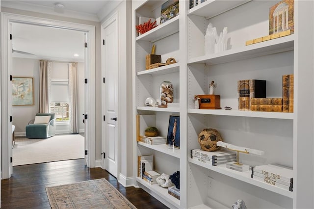 2110 Timball Rd NW, Atlanta, GA 30318 - corridor with dark wood-type flooring, built in features, crown molding, and baseboards