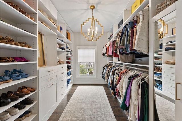 2110 Timball Rd NW, Atlanta, GA 30318 - spacious closet with a chandelier and dark wood finished floors
