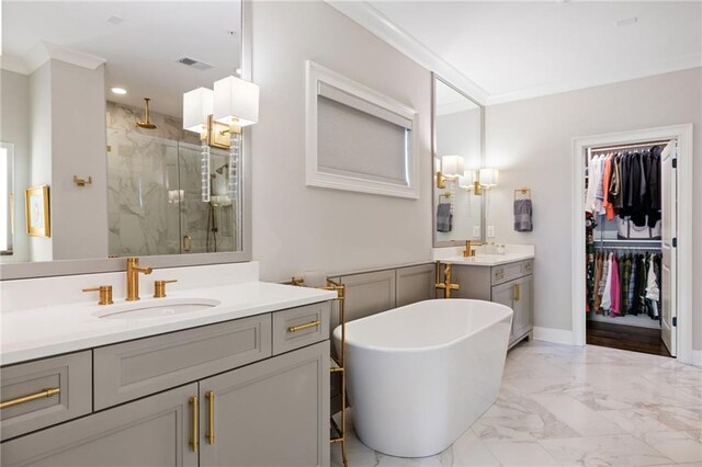 2110 Timball Rd NW, Atlanta, GA 30318 - bathroom featuring a marble finish shower, vanity, a freestanding bath, marble look tile flooring, and a spacious closet