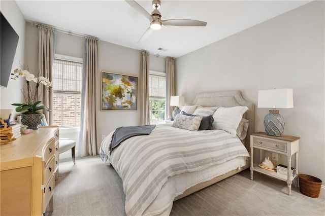 2110 Timball Rd NW, Atlanta, GA 30318 - bedroom with light colored carpet and ceiling fan