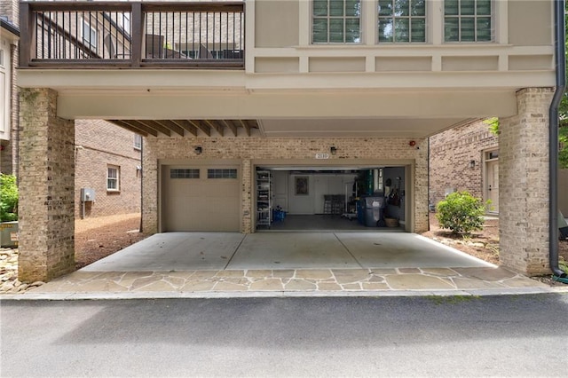 2110 Timball Rd NW, Atlanta, GA 30318 - garage featuring concrete driveway and a carport