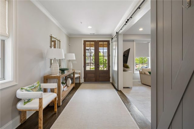 2110 Timball Rd NW, Atlanta, GA 30318 - entrance foyer with wood finished floors, recessed lighting, ornamental molding, french doors, and baseboards