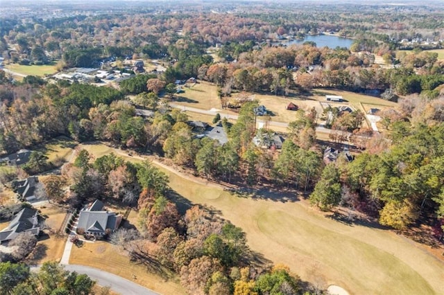 bird's eye view with a water view and golf course view