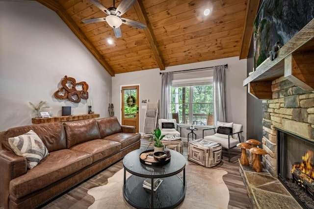 living room featuring a ceiling fan, wooden ceiling, high vaulted ceiling, wood finished floors, and a fireplace
