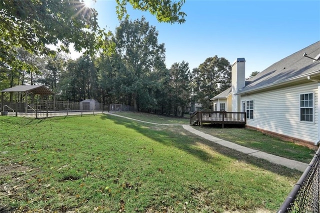 9435 Grande Dr, Winston, GA 30187 - view of yard with a wooden deck and fence