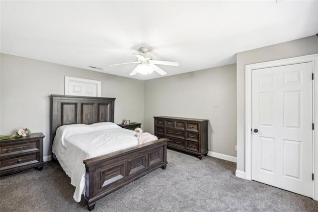 bedroom with a ceiling fan, light colored carpet, visible vents, and baseboards