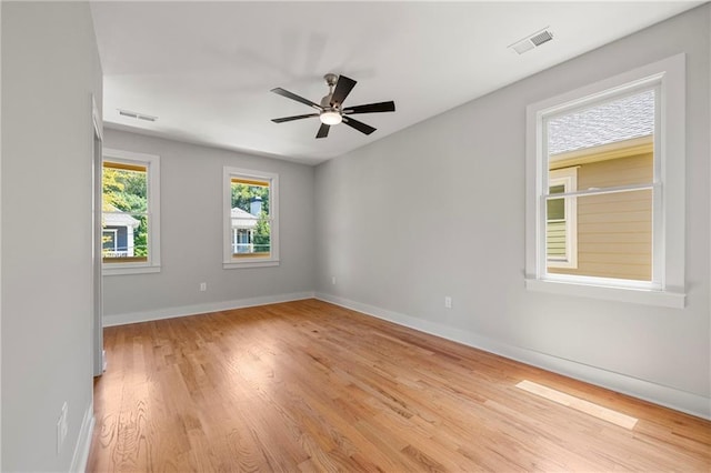 110 Hogue St, Atlanta, GA 30312 - empty room featuring light wood finished floors, ceiling fan, and baseboards
