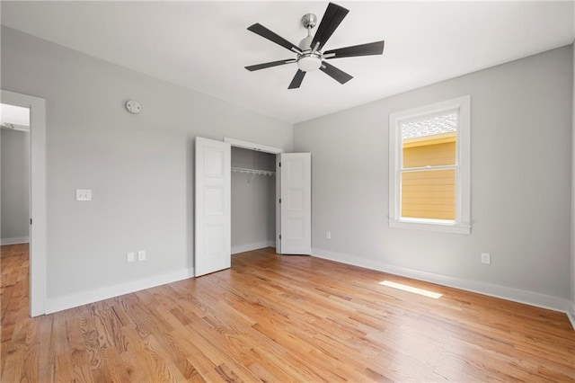 110 Hogue St, Atlanta, GA 30312 - unfurnished bedroom featuring a closet, light wood finished floors, baseboards, and multiple windows