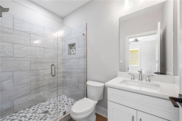 110 Hogue St, Atlanta, GA 30312 - bathroom featuring toilet, a shower stall, vanity, and ceiling fan