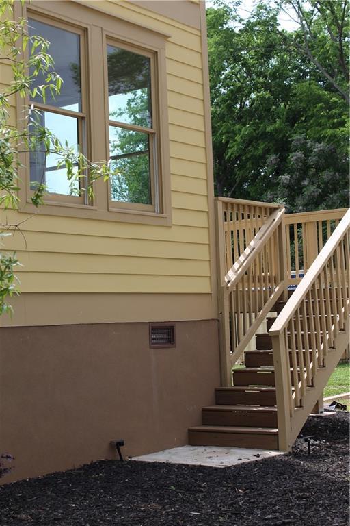110 Hogue St, Atlanta, GA 30312 - view of property exterior with crawl space, stairway, and a deck
