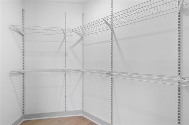 42 Riverdale St, Canton, GA 30114 - empty room with light wood finished floors, ceiling fan, and baseboards