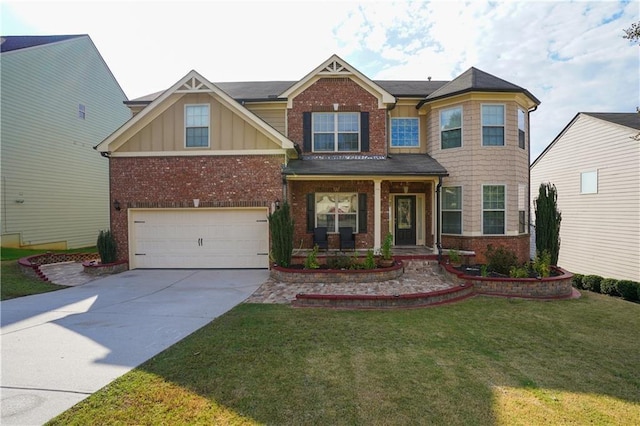 craftsman-style house featuring a garage, a front lawn, covered porch, brick siding, and driveway