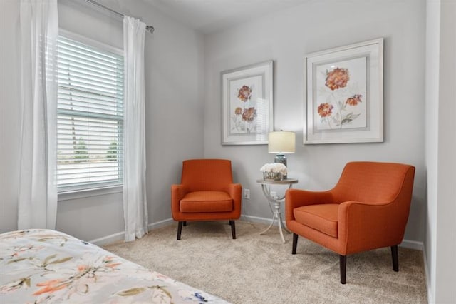 carpeted bedroom with baseboards