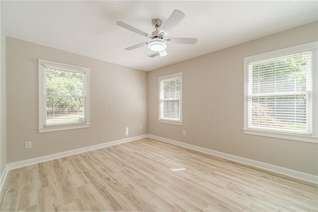 4120 Grady Smith Rd, Loganville, GA 30052 - unfurnished room with plenty of natural light, light wood-style flooring, and a ceiling fan