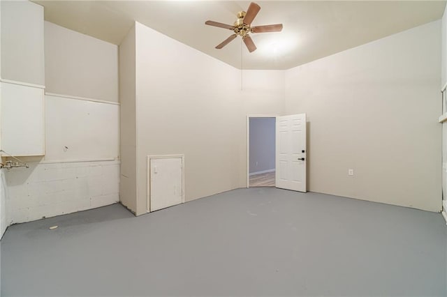 4120 Grady Smith Rd, Loganville, GA 30052 - unfurnished room with finished concrete floors and a ceiling fan
