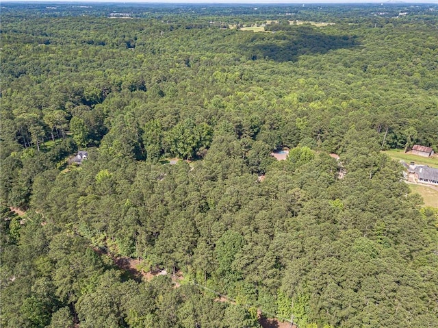 4120 Grady Smith Rd, Loganville, GA 30052 - aerial overview of property's location featuring a heavily wooded area