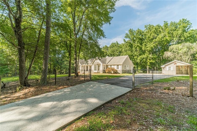 4120 Grady Smith Rd, Loganville, GA 30052 - view of front of home featuring a gate and concrete driveway