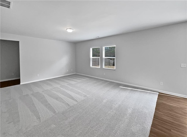 unfurnished room with carpet